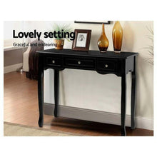 Load image into Gallery viewer, Styled black hallway table with vases and photographs on top of it.