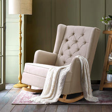 Load image into Gallery viewer, Cream Beige Classic Rocking Chair with tufted back, in a comfy and stylish home setting with green wall and cream blanket.
